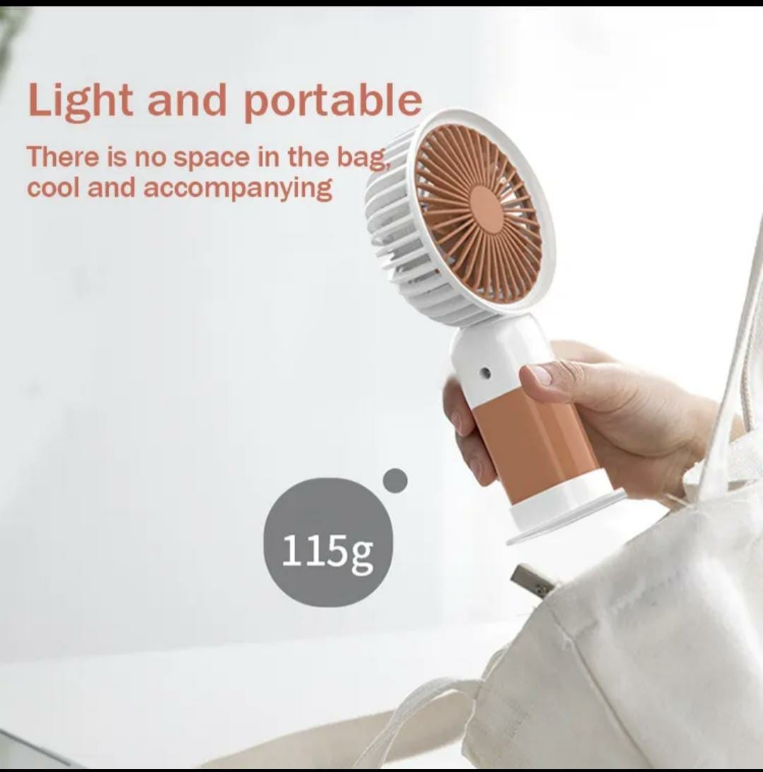 2-in-1 Handheld Mini Fan with Mobile Phone Stand – Random Colors